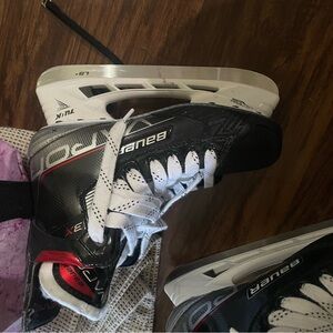 Bauer Black and White Hockey Skates with Red Accents